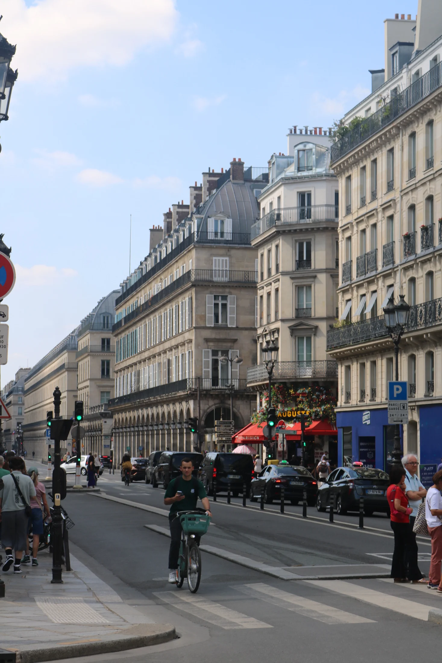 Parisian streets and cafés around a busy intersection